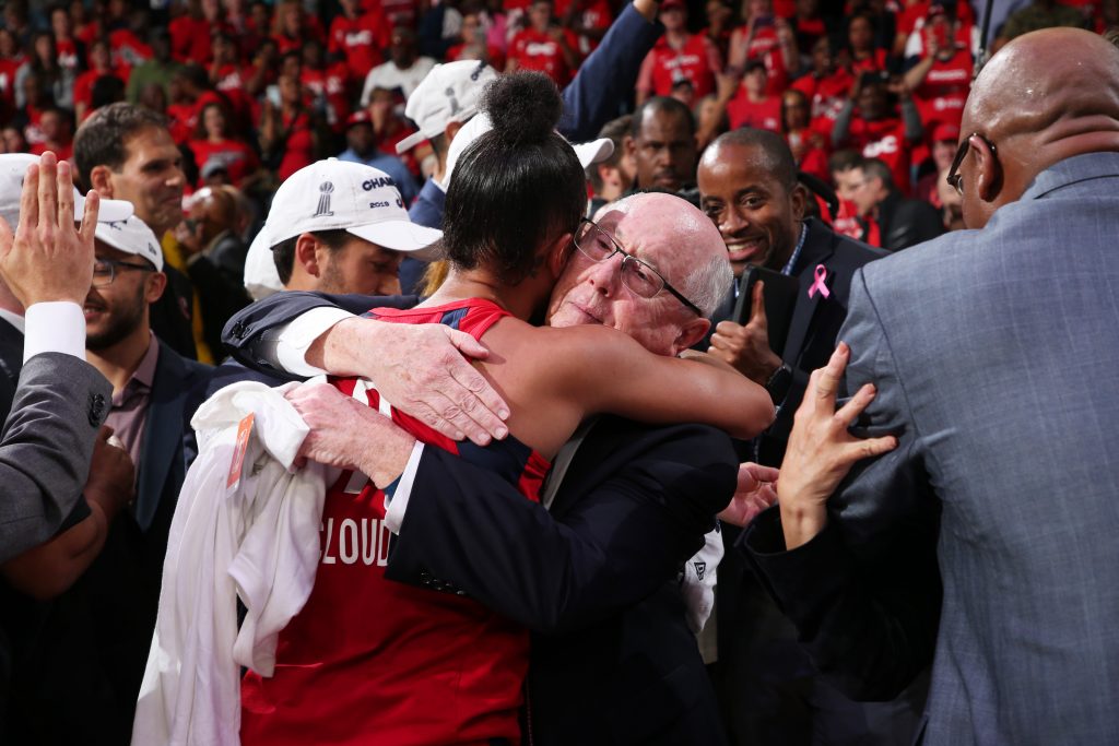 Natasha Cloud embraces head coach Mike Thibault after the Mystics' win.