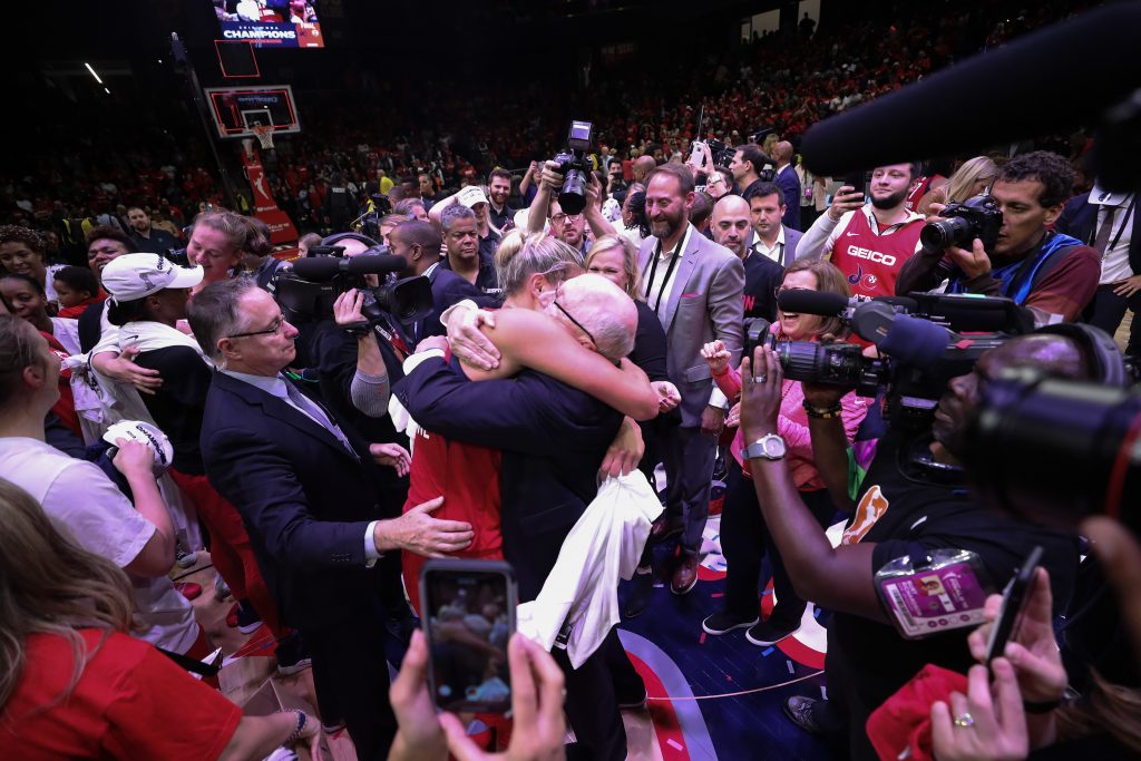 Elena Delle Donne and Mike Thibault celebrate their first-ever WNBA Championship.